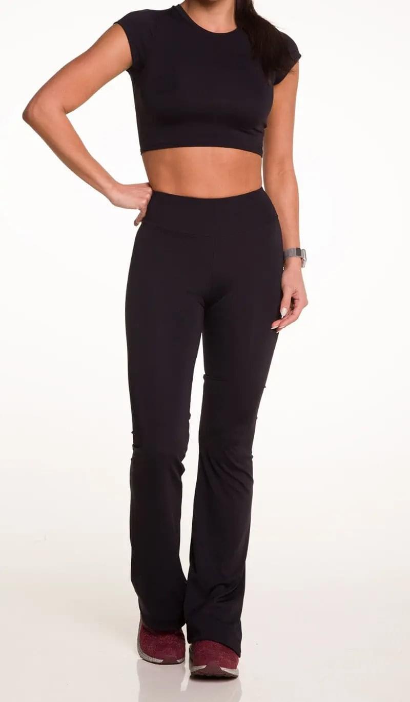 Freedom Flare leggings in black, front view on model