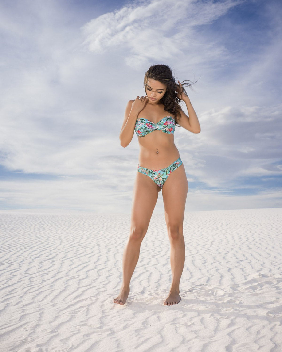 Laguna Twist Bandeau Bikini Bottom in tropical print, lifestyle photo 5 | Beeluxxe