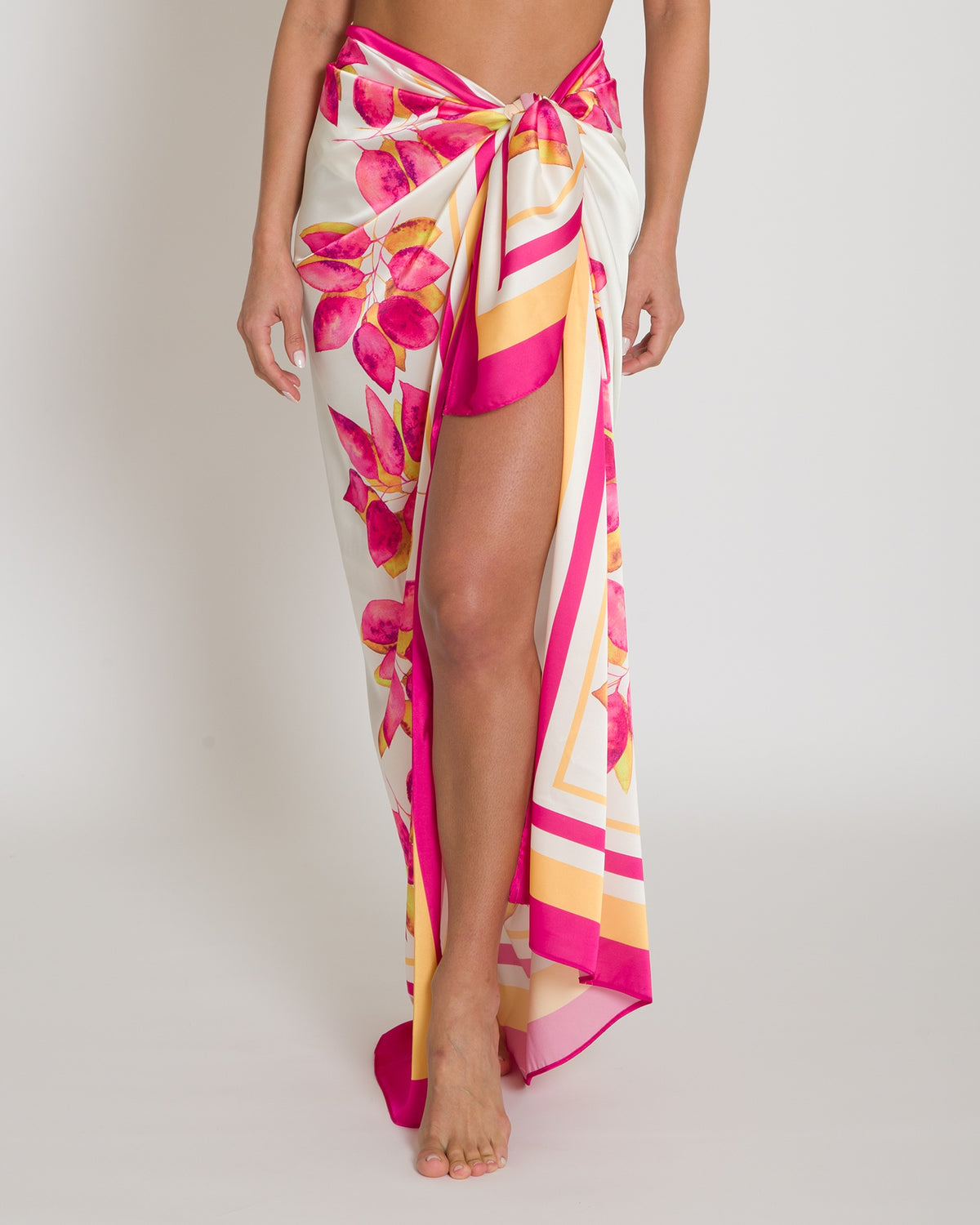 Beeluxxe Petalia Silk Cover-Up in floral print, worn as a tied sarong, front view