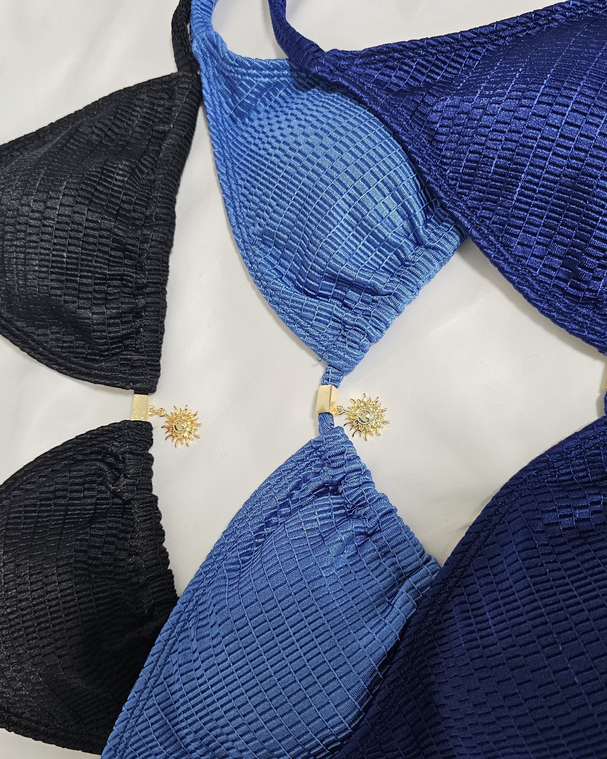 Solar Glow Sun Charm Bikini Top in black, petroleum blue, and navy, Beeluxxe